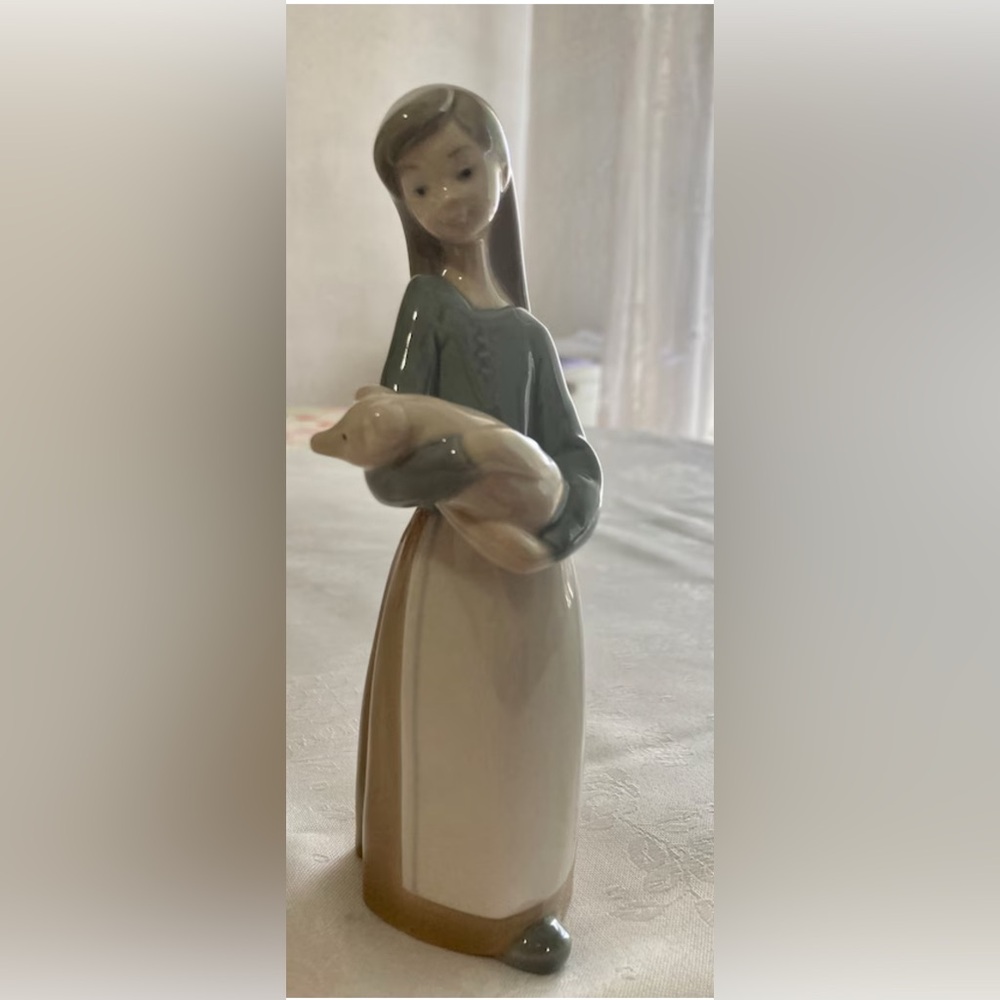 Lladro Collection "Girl holding Pig" preowned  hand made in Spain
